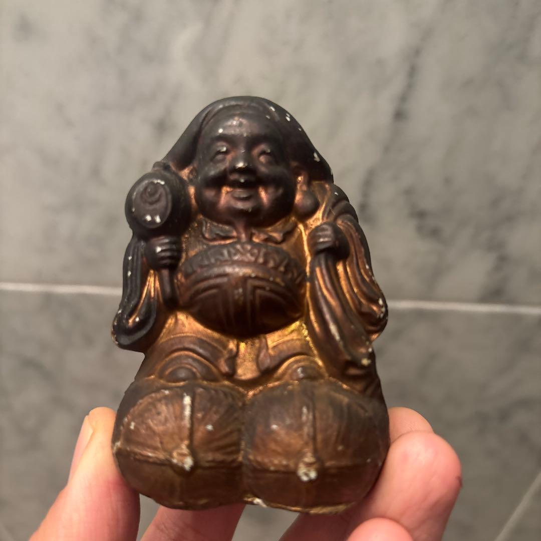 アンティーク明治時代平和的なお顔で 笑顔が素敵な大黒様の陶器オブジェ