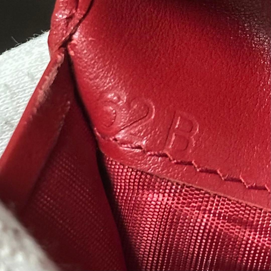 PRADA プラダ　折り財布　ゴールドロゴ　シボ革　バイカラー　赤　黒