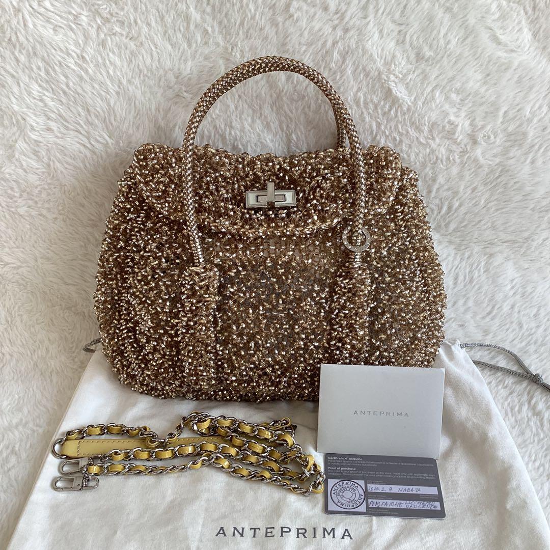 アンテプリマ 2way ハンドバッグ　ショルダーバッグ ターンロック　ゴールド