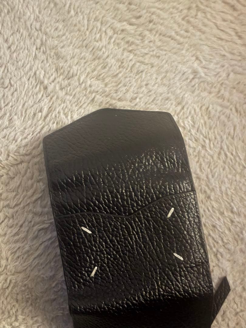 黒いレザー三つ折り財布