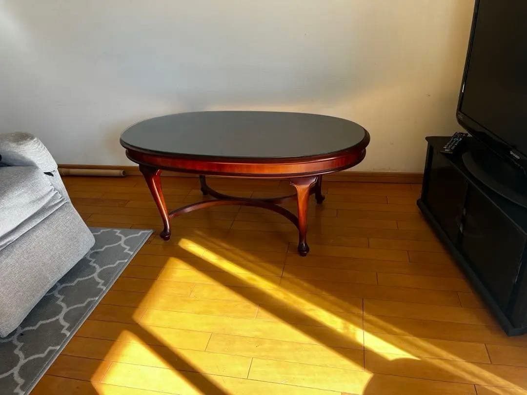 ダークブラウン楕円形木製テーブル