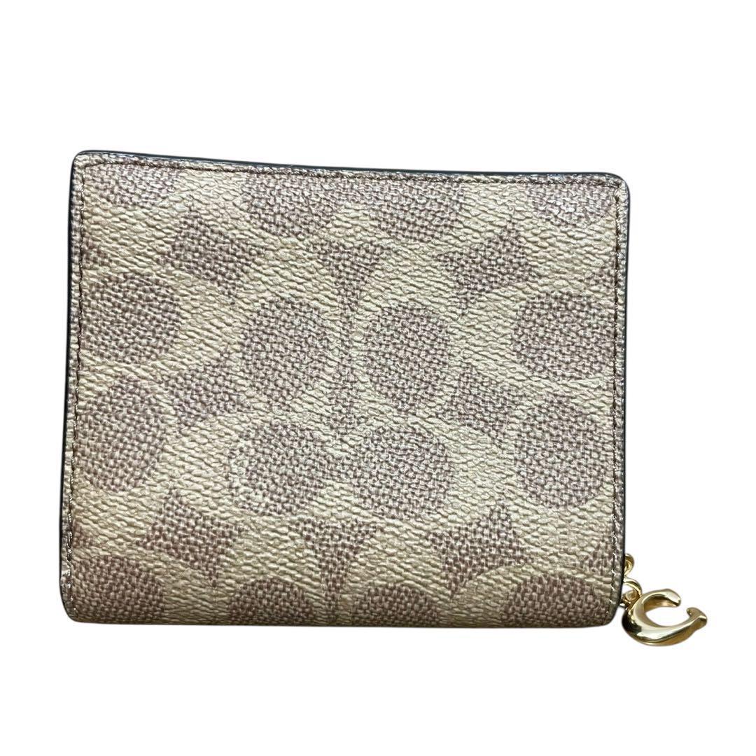 【新品】コーチ スナップウォレット コズミック シグネチャー レキシー