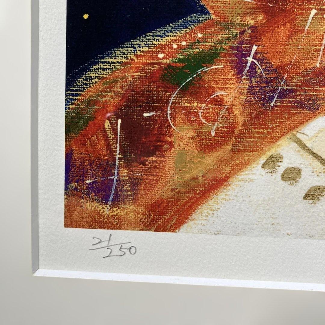 版画　前田麻里「オカリナを吹く少年」