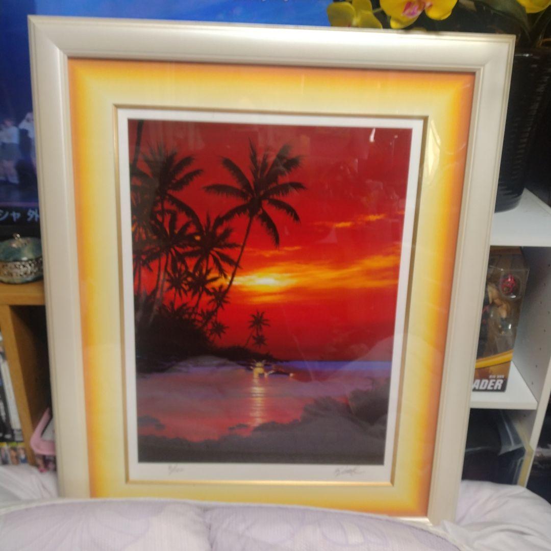 題名夕焼けの海、作者 Kim 、版画Ｎｏ．8/100です。