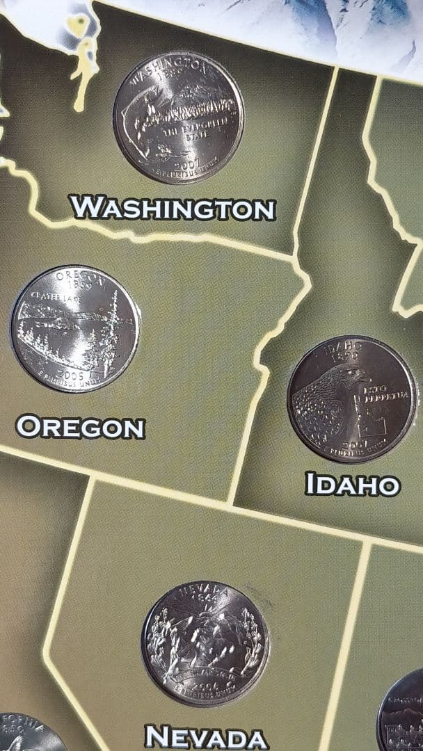 ☆。アメリカ25セントクォーター50州記念アルバム(56枚在中)。