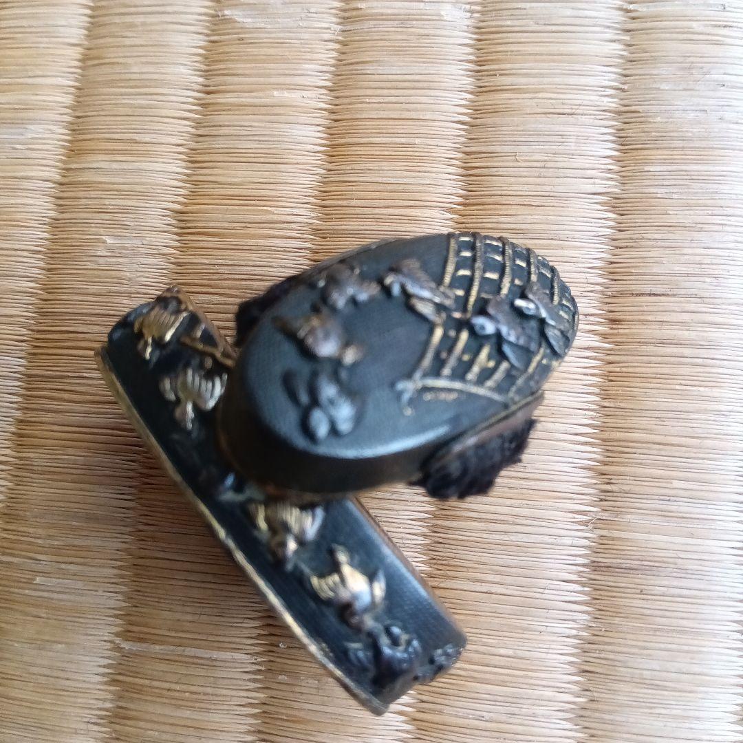 武具　刀装具　古い柄の縁頭