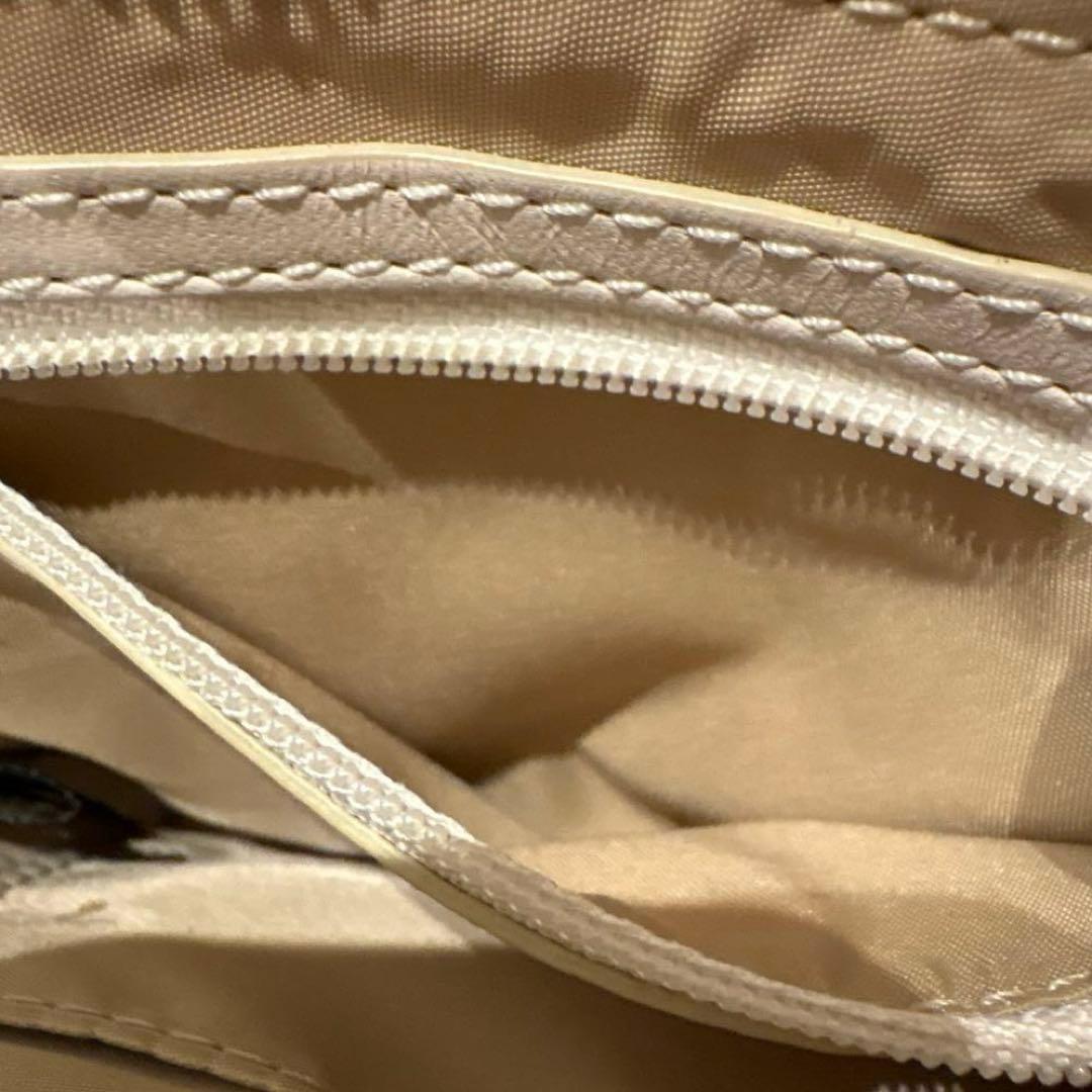 【新品】COACH コーチ シグネチャー柄キャンバス ポピー リストレットポーチ