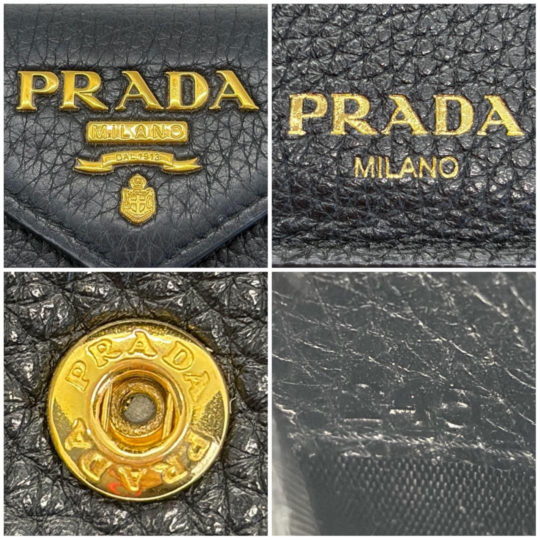 RFID搭載/現行✨プラダ　三つ折り　財布　金ロゴ　シボ革　レザー　黒