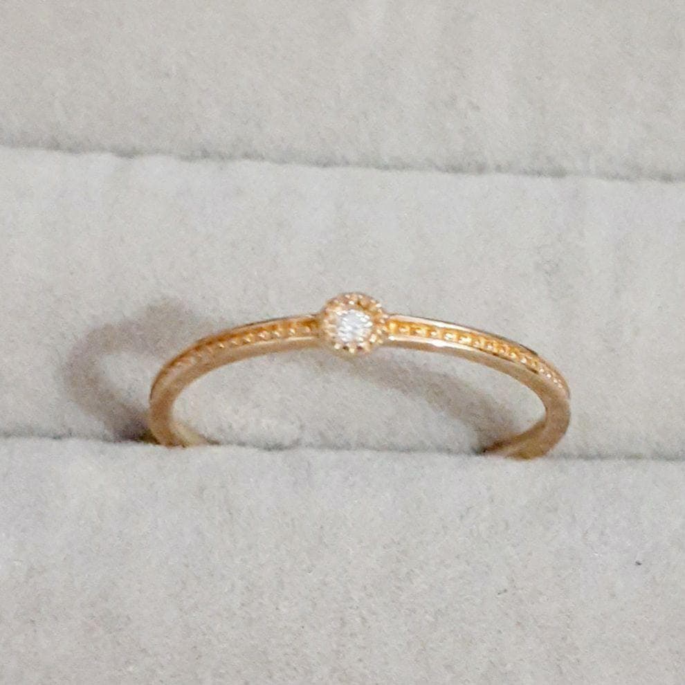 エテ K10YG レイヤード ミル打ち 1粒ダイヤモンド リング