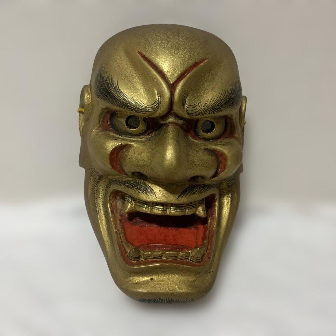 金色の木製能面