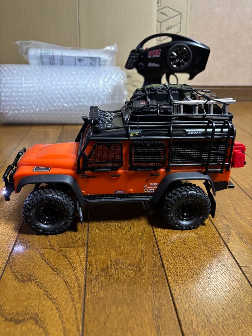 トラクサス4M、社外品リヤトレーラー付き