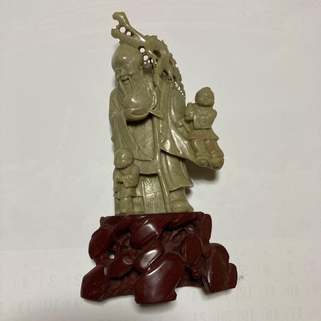 老人と子供の彫刻