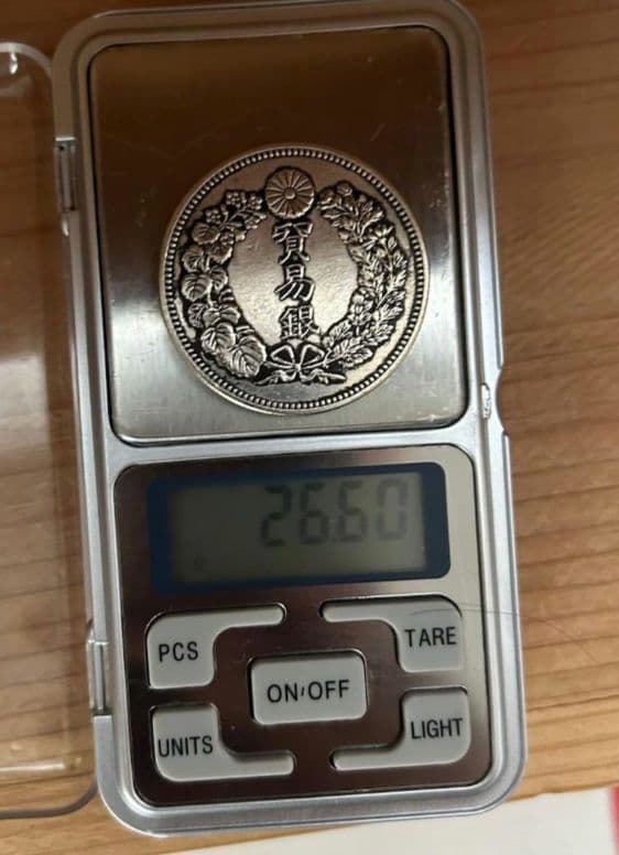 貿易銀　明治七年製