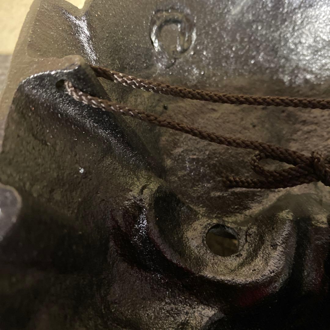 鬼の面 黒色 金色の歯