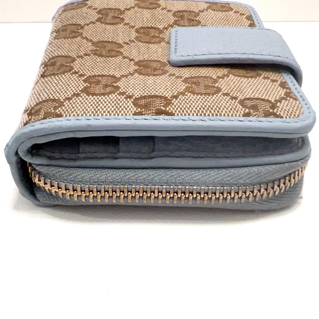 グッチ 折り財布 GGキャンバス GG ラウンドファスナー コンパクト 水色