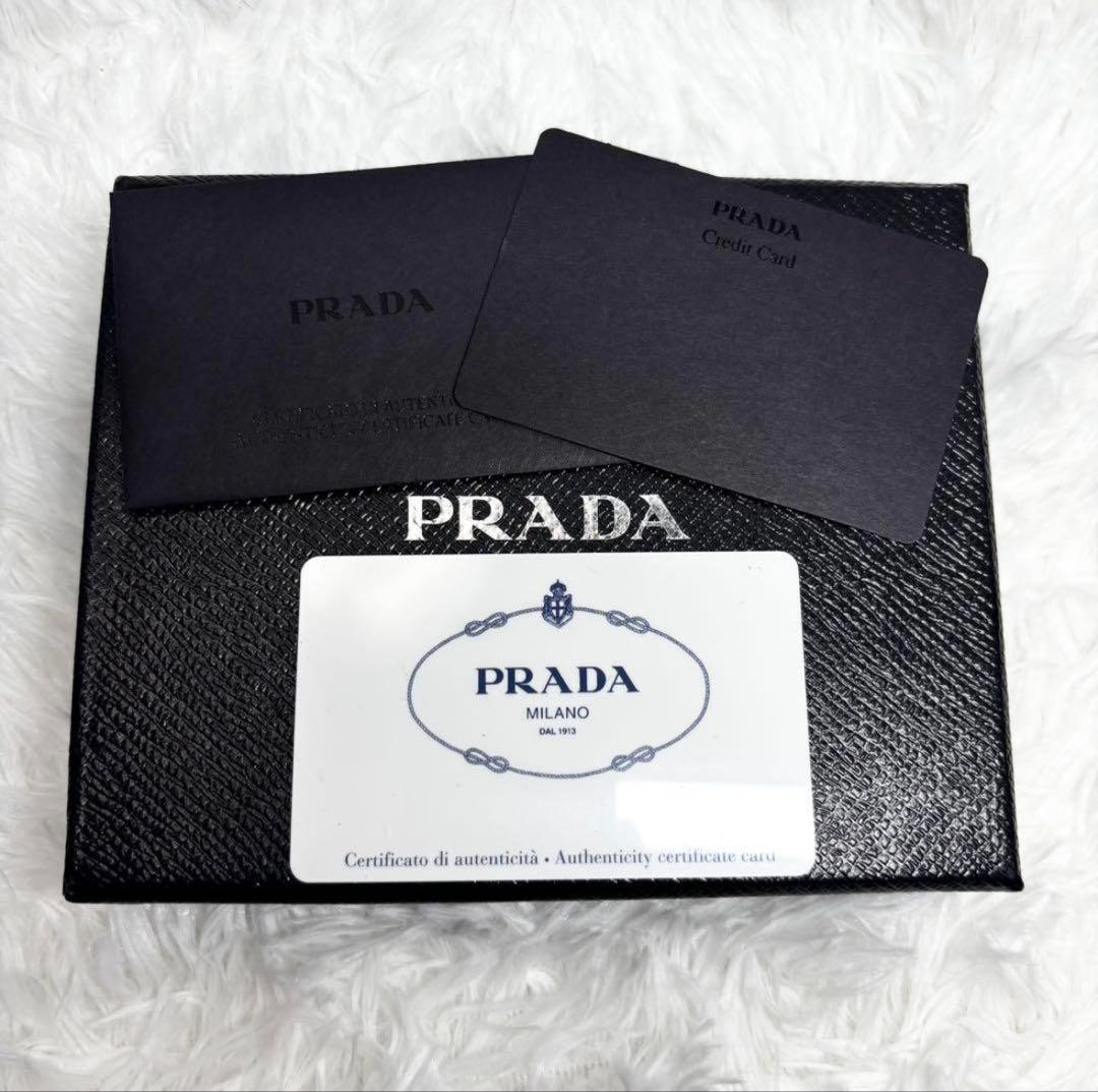 ✨美品✨ プラダ 二つ折り 財布 ゴールドロゴ サフィアーノ レザー ブルー 青