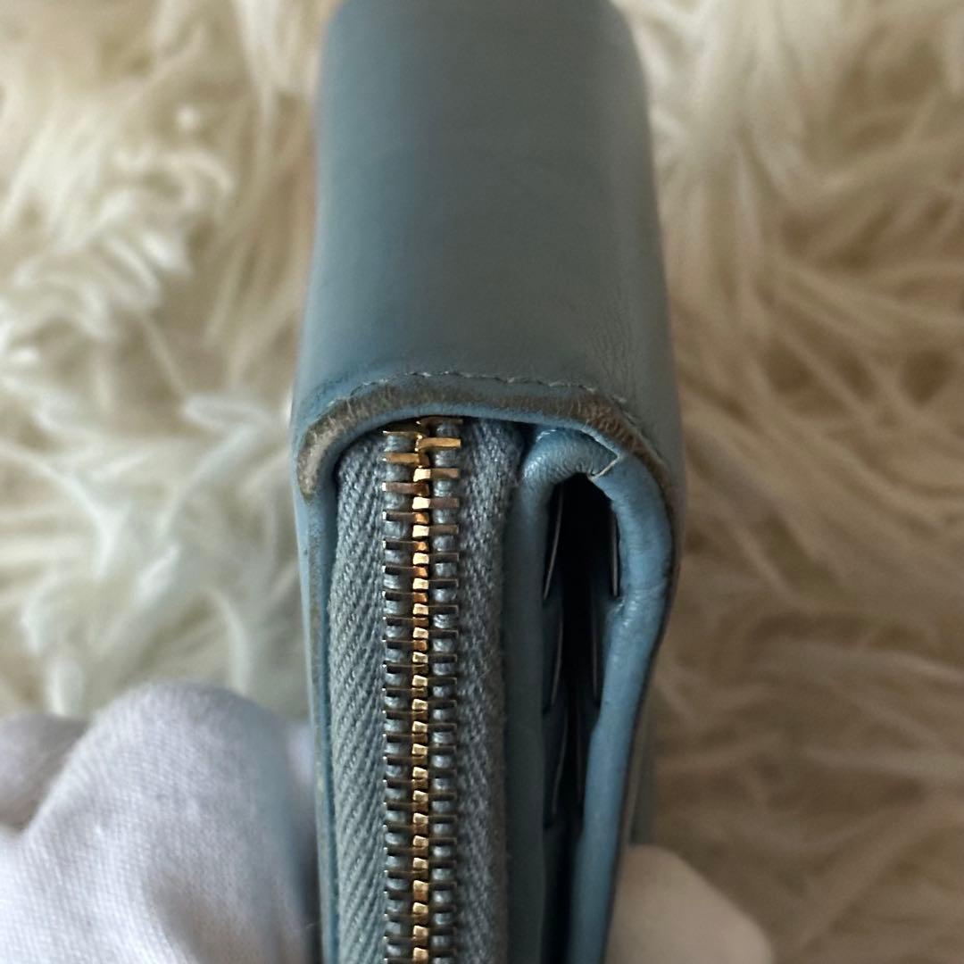 イヴサンローラン 二つ折り財布 型押し レザー ジップ ライトブルー コンパクト