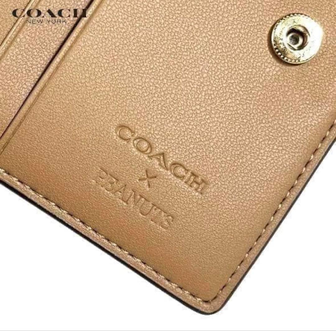 初売り　COACHコーチシグネチャースヌーピーコラボ二つ折り財布