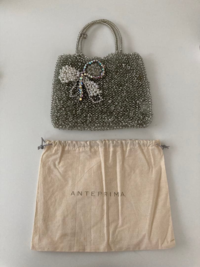 【美品】アンテプリマ　ビーズ装飾リボンモチーフ　ワイヤーバック